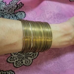 Elegant Gold Tone Bangle Set